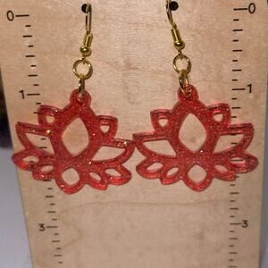 Handmade epoxy resin lotus flower earrings - translucent red glitter gold flecks